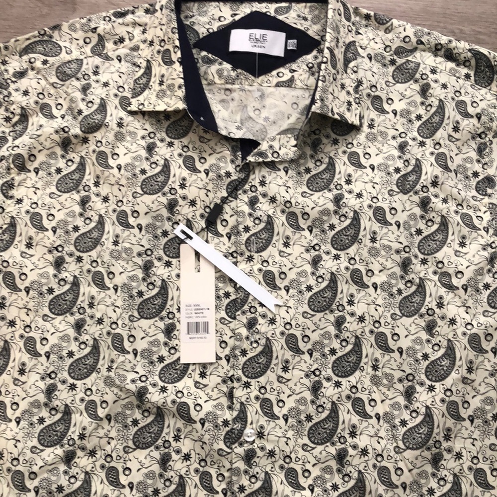 White and Black shirt Brand new. You can ware for any occasion.